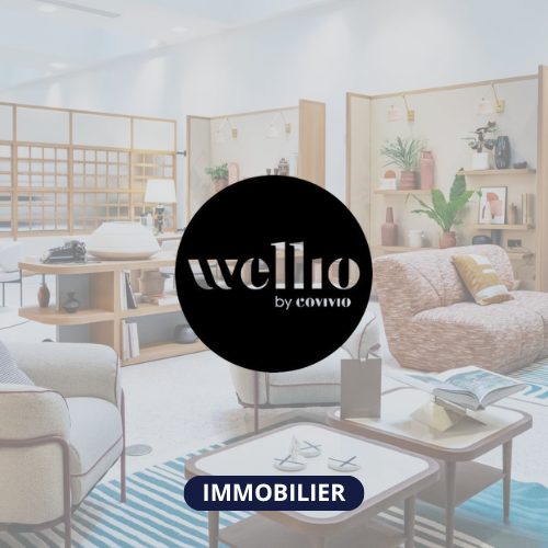 Image d'une salle de pause avec au premier plan le logo Wellio by Covivio